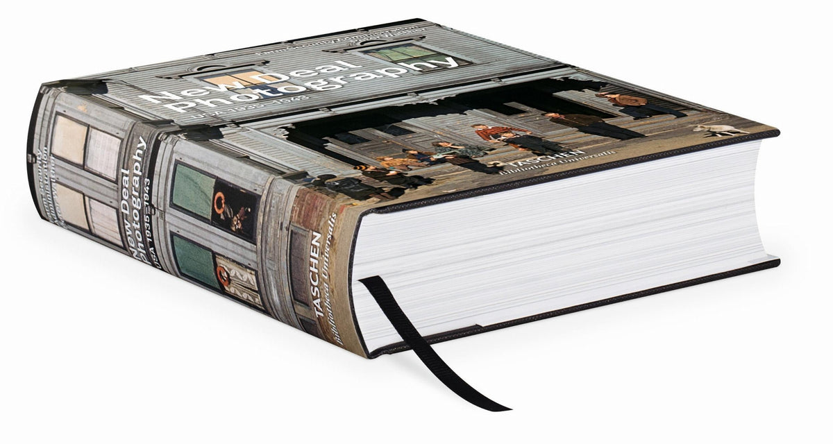 New Deal Photography book with a ribbon marker on a white background. Photographs documenting the United States from 1935-1943.